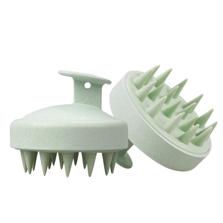 Cepillo de cabello de silicona de paja de trigo biodegradable en cuero cabelludo
